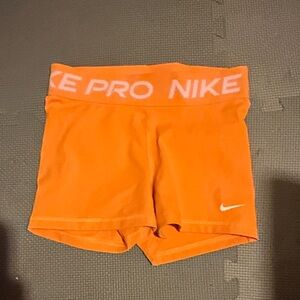 Nike Women's Bright Orange Athletic Shorts